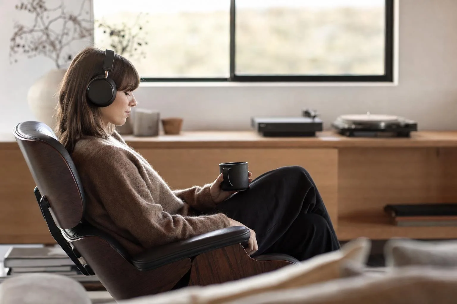 A listening room with headphones and a desktop amplifier
